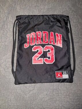 Jordan Black Drawstring Bag with Red '23' Graphic